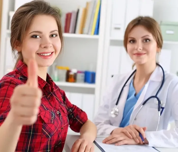 Participant with physician during a research visit