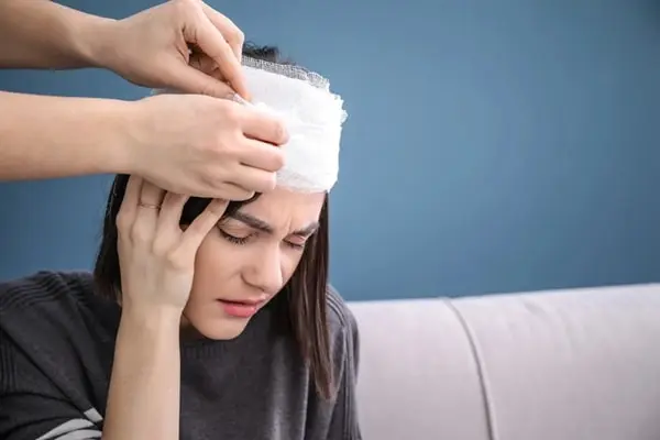 Participant receiving care for a head injury