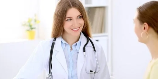 Doctor speaking with a clinical trial participant