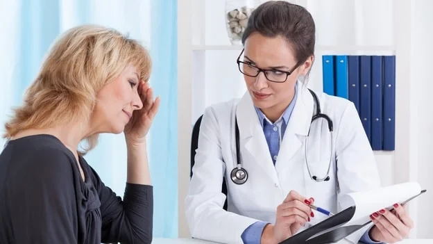 Patient speaking with a physician about a clinical study
